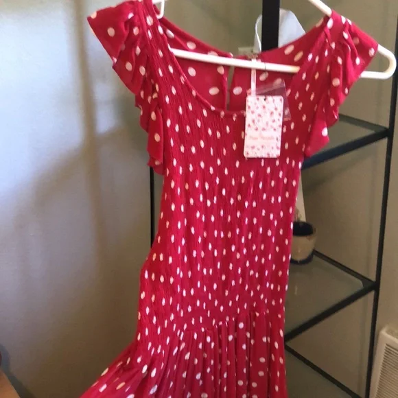 Free people dress, new with tags. Polka dots, pockets, super comfy and sexy. - Picture 7 of 7